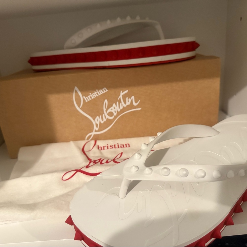 Christian Louboutin Authentic
Spike Red Sole Flip Flops